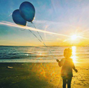 Lawton releasing balloons on Sullivan's Island for our baby boys