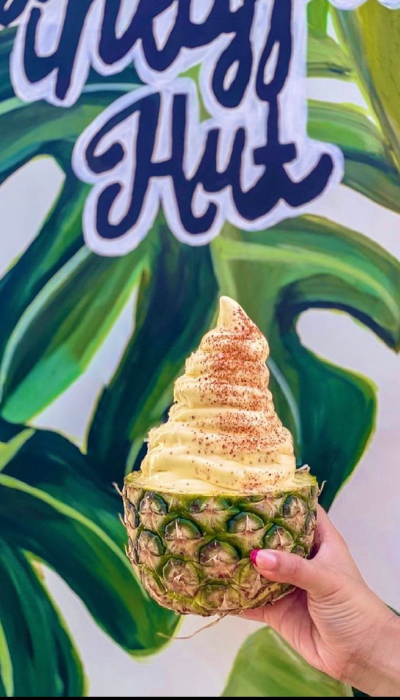 dole whip served in a pineapple bottom.