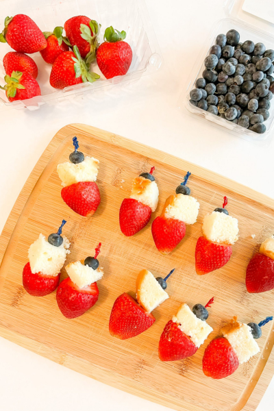 Shortcake Bites with strawberries, shortcake, and blueberries on toothpicks