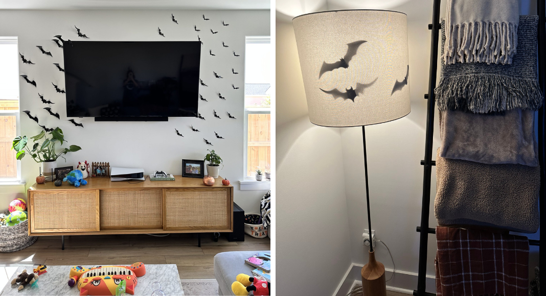 A living room TV surrounded by paper bats on the wall. A floor lamp with paper bats on the inside.