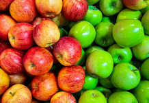 EASY Apple Recipes: a large pile of red apples on the left and green apples on the right