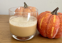 Fall cocktails posed with small pumpkins