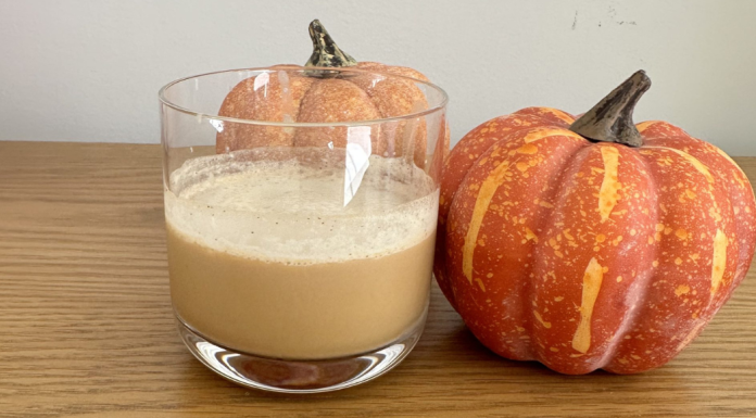 Fall cocktails posed with small pumpkins
