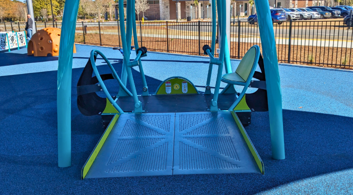 Wheelchair accessible swing at Park Circle Playground