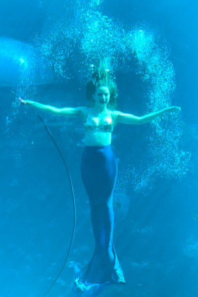 A mermaid under water.