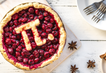 A berry pie with top crust in the shape of the pi symbol for National Pi Day.