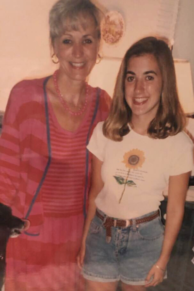 Mom always knew: a teen girl standing with her mom in the 90s.