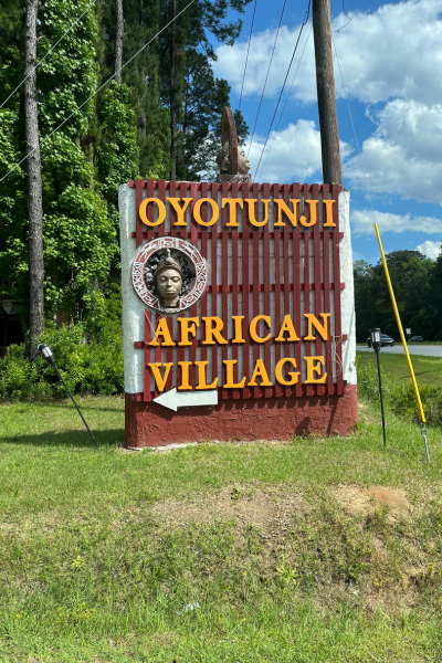 A sign for Oyotunji African Village.